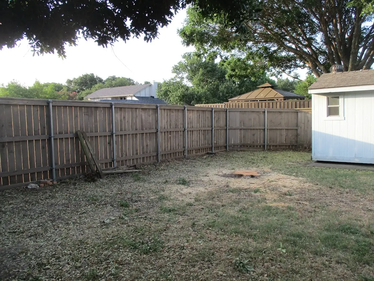 Cleared yard after professional tree removal in Arkansas City